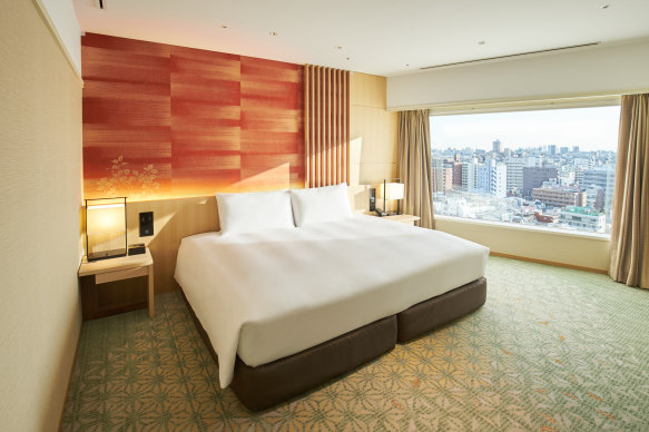 A king bedroom with huge picture window.