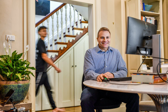 NAB economist Dean Pearson is looking forward to returning to the office three days a week from next week. 