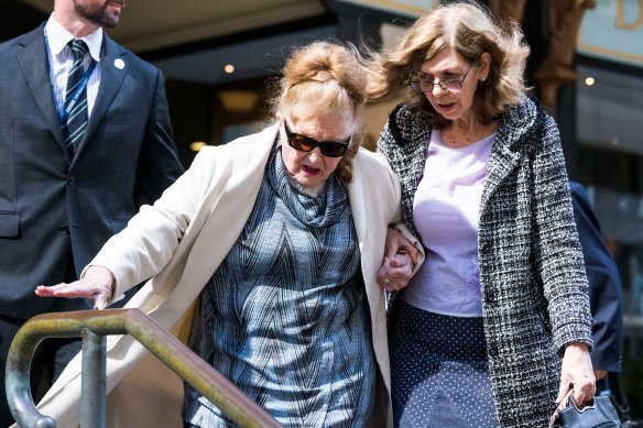 Barbara Taylor, Pentecostal pastor and aunt of Brett Sengstock (centre), leaves court on Tuesday. 