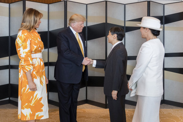 Emperor Naruhito US President Donald Trump, flanked by Empress Masako and First lady Melania Trump.