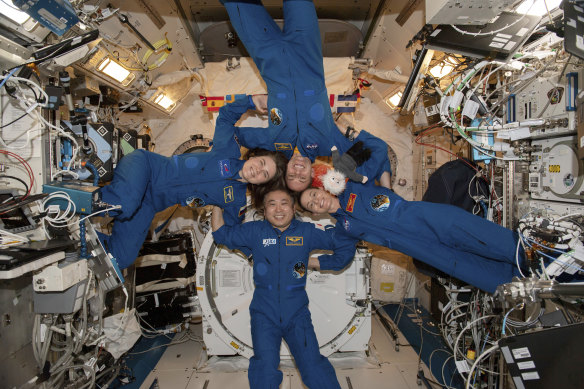 Expedition 68 Flight Engineers Anna Kikina of Roscosmos, Josh Cassada and Nicole Mann from NASA, and Koichi Wakata of JAXA inside the International Space Station’s Kibo laboratory module on March 1.