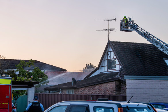 A ladder truck was used to extinguish the blaze from above but Fire and Rescue NSW said the roof of the property had collapsed. 