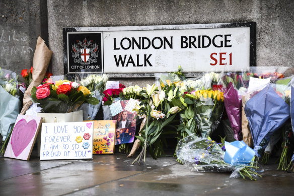 Flowers have been left at London Bridge in memory of the dead.