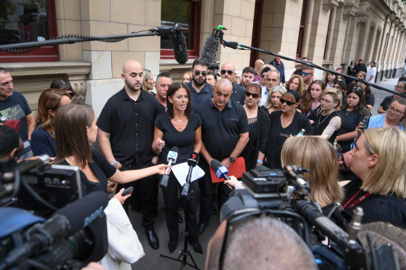 Celeste Manno’s mother Aggie Di Mauro (centre), flanked by Celeste’s father, Tony, and brother Alessandro, speaks to the media on Thursday.