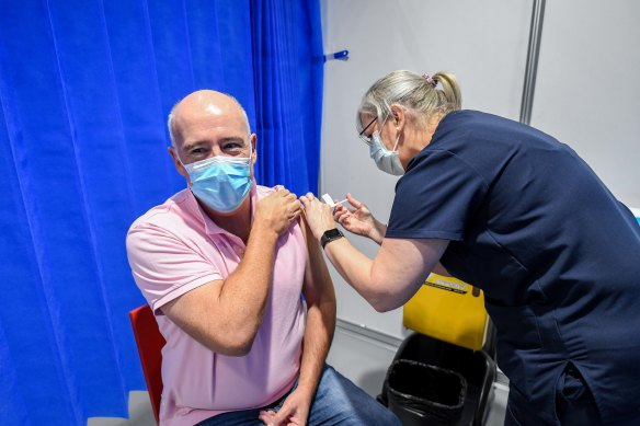 Tim Adamson, 51, was among those getting the AstraZeneca vaccine at the  Melbourne Convention and Exhibition Centre on Monday.