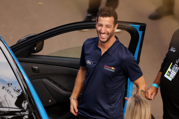 Daniel Ricciardo appears onstage on Thursday to unveil a new Ford car, as part of his role with Red Bull. 