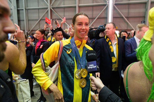 McKeon arriving back from the Paris Olympics, which would be her last Games.