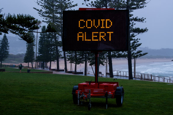 A COVID alert sign at Dee Why on the northern beaches.