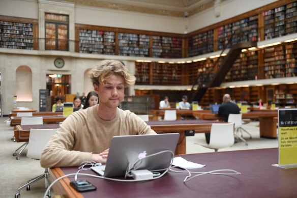 University student Nelson Fishlock enjoys the reading room at the State Library of NSW. 