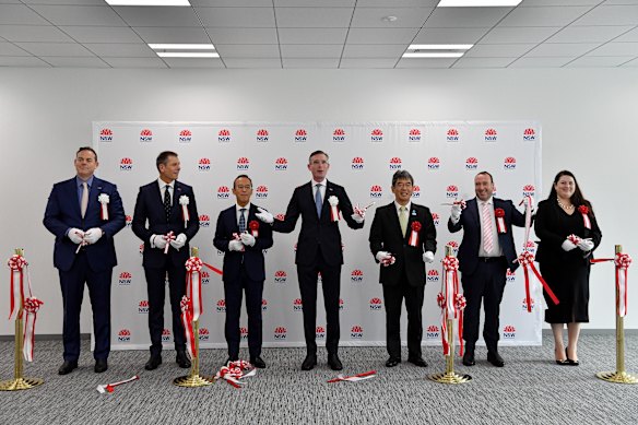 Mike Newman, far left, with Premier Dominic Perrottet, centre, during a trade trip to Tokyo in 2022. Newman said some of his expenses were due to paying for train tickets for the entire delegation. 