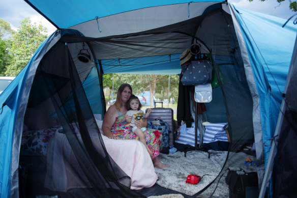 Karrina Kemp and her three children are living in a tent in Ballina while waiting to cross the border to Queensland.