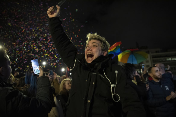 A supporter of the same-sex marriage bill, reacts at Syntagma Square, in Athens, Greece.