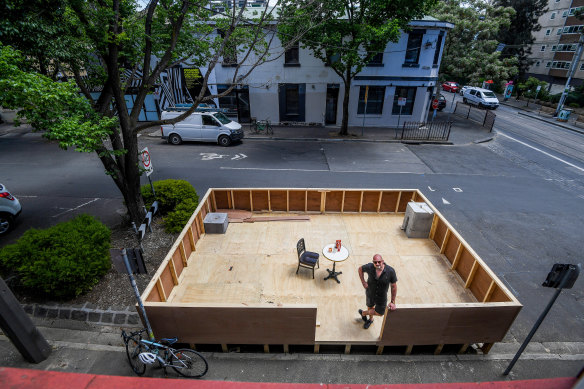 The parklet outside The Everleigh cocktail bar is under construction.