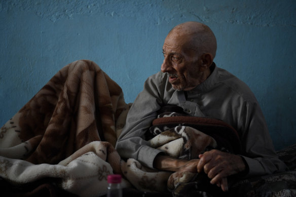 Abdul Rahman al-Amo, 85, refuses to leave his home in Kara Kwea village. Many of his neighbours have already fled.