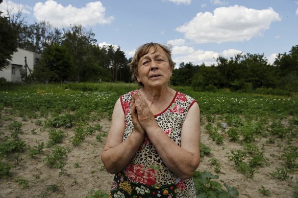 Nadiya Tereshchenko, 65, in the garden of her home in Yahidne. north-east of Kyiv, where the entire village were locked in a school basement by Russian soldiers.