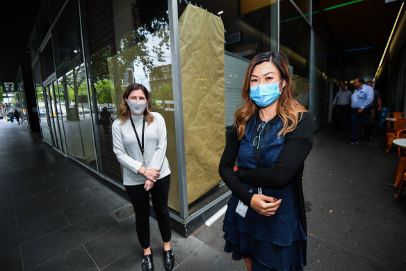CBD workers Naomi Lions and Teri Tran returned to their office on Tuesday, but would like to continue working from home part-time.