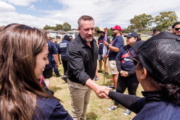 Troy Wright from the CPSU speaks to members at the rally on Friday.