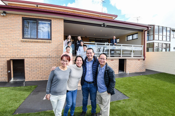 Four of the six Chu children, along with some of their children at the back, who grew up in their beloved family home since 1972. (L-R Kyle, Susan, John and Colin Chu)