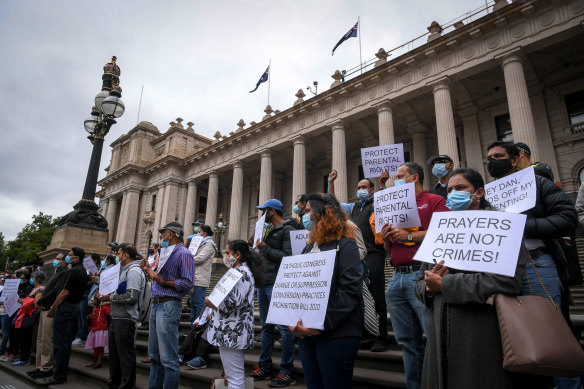 Protesters against the government’s gay conversion therapy legislation on the steps of Parliament House during the debate earlier this year. 