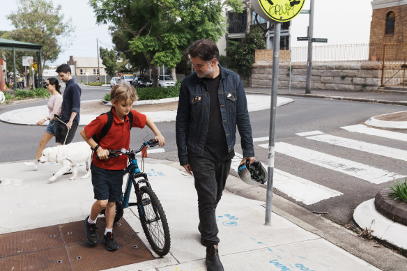 Nick Smith picking his son Harper up from school on Friday.