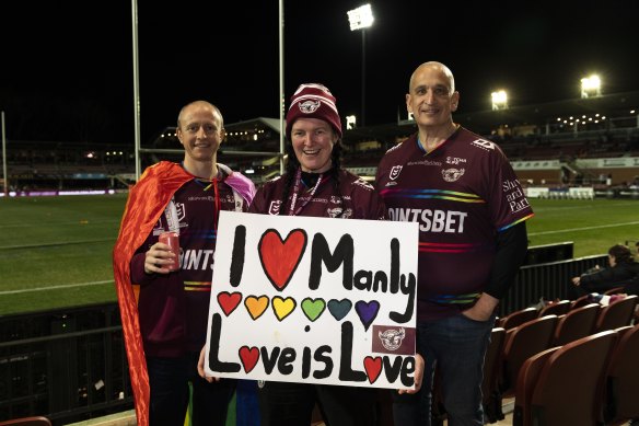 Manly supporters Garry Moore, Angela Martinez and Didier Rivet showed their support for the LGBTQ community at Brookvale on Thursday night.