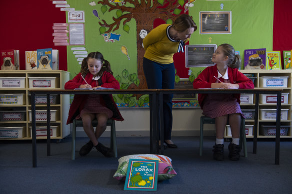 Teacher Kylie Hamersma with her Year 3 students in their classroom at Emu Plains Public School.