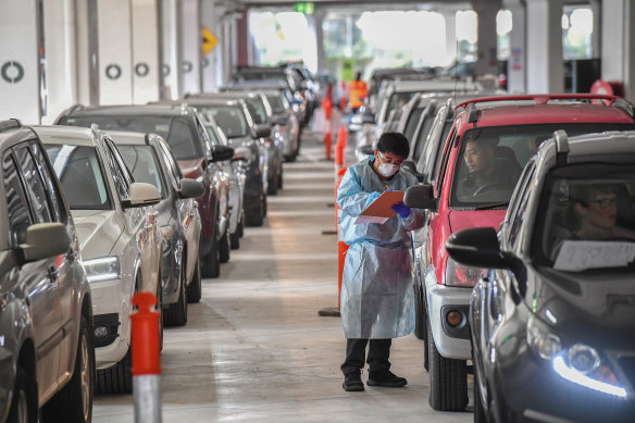 A pop-up drive through COVID-19 testing site at Footscray Bunnings in Melbourne’s inner west.