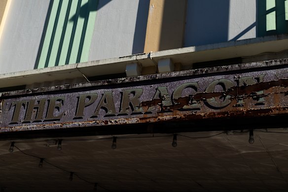 The Paragon’s awning  tells the tale of much of its internal disrepair.