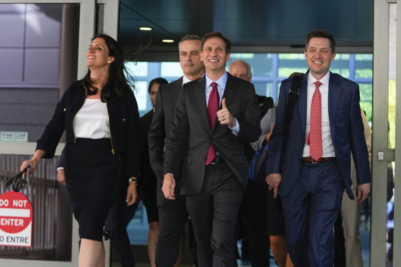 Lawyers for Dominion Voting Systems (from left) Davida Brook, Justin Nelson and Stephen Shackelford leave the New Castle County Courthouse in Wilmington, Delaware, after the case against Fox News was settled.