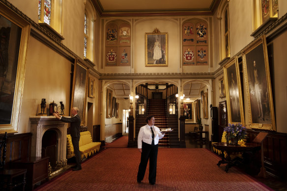 The main hall of Government House, where a portrait of Queen Elizabeth II hangs.