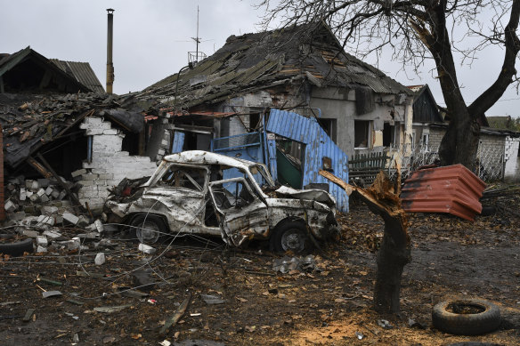 A damaged Soviet-era Ukrainian car “Zaporozhets” next to a destroyed apartment building after Russian shelling in Pokrovsk, Donetsk, Ukraine, on Friday.