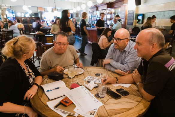 Trivia night at the Bridge View Hotel, Willoughby. James Ward (right) with wife Yasmina Ward, and friends Tim Perich and Dave Adcock, who have been participating in trivia nights for more than 20 years.