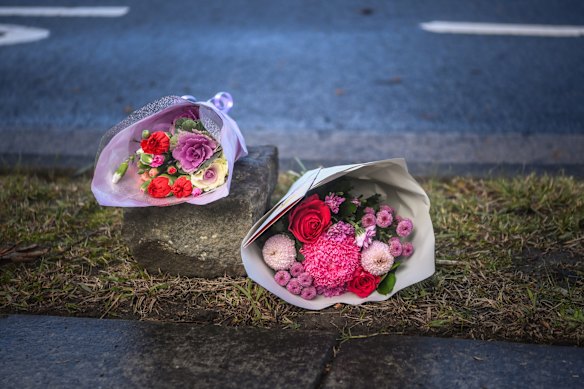 Flowers left at the site of the crash in Wantirna South.
