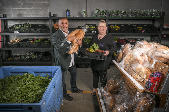 Benefactor Joe Calleja with Bk 2 Basics Melbourne founder Kelly Warren at the Narre Warren warehouse.