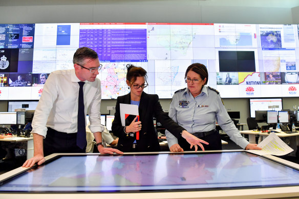 NSW Premier Dominic Perrottet is briefed on the flood situation in the state’s Central West on Tuesday.