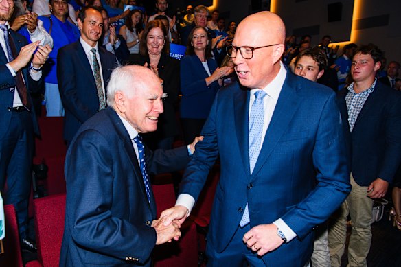 Peter Dutton with former prime minister John Howard at the Liverpool Catholic Club in Prestons for the Coalition campaign launch on April 13.