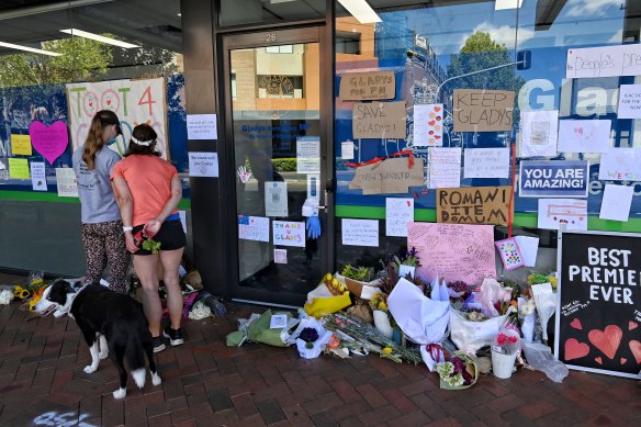 Some of the messages and flowers left outside the Gladesville office of Gladys Berejiklian on Tuesday. 