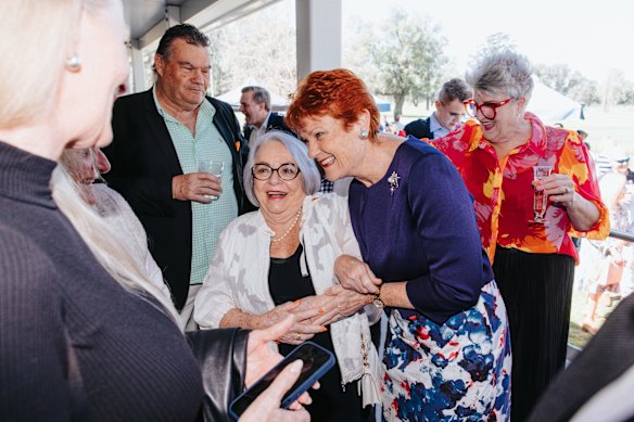 Hanson is mobbed at Singleton Golf Club.