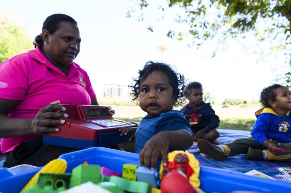 The Moriaty Foundation’s Indi Kindi is a program for children in remote Aboriginal communities, integrating health, wellbeing, education and development. Educator Deandra McDinny with Lloyd, 11 months. 