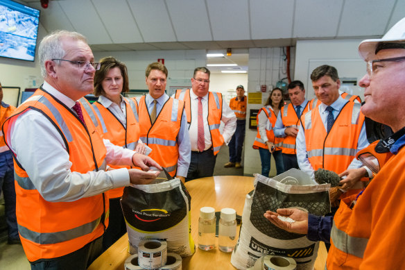 Scott Morrison, left, and Angus Taylor, second right, visited the Incitec Pivot Limited plant at Gibson Island in Brisbane on Monday.
