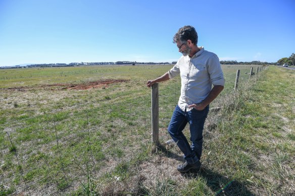John Clarke inspects the damage at  Lake Bolac.