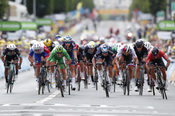 Cavendish beat Belgian Jasper Philipsen and France’s Nacer Bouhanni in the sprint for the finish.