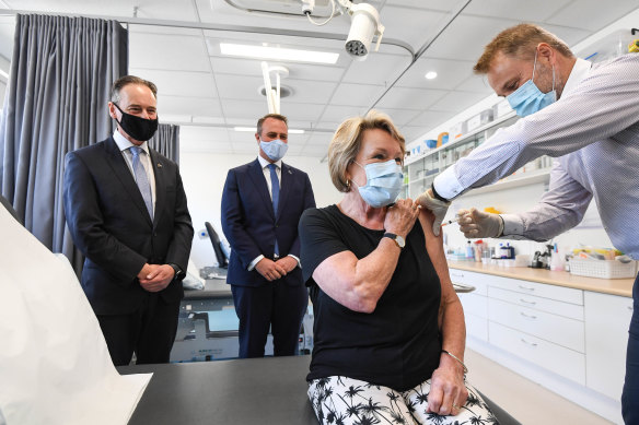 Health Minister Greg Hunt, Liberal MP Tim Wilson, patient Dale Austin and Dr Nick Kokotis in Melbourne on Monday. 