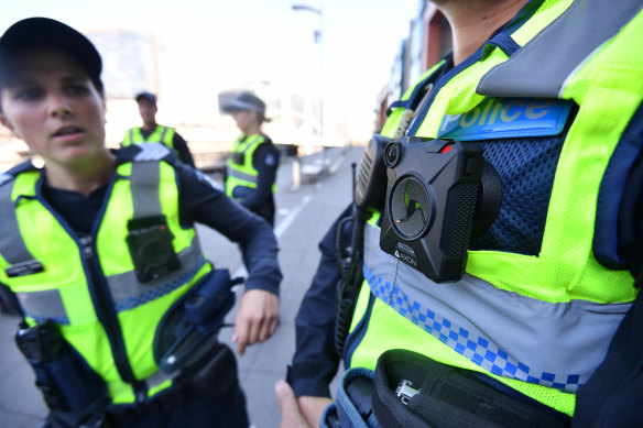 Victoria Police wearing body cameras.