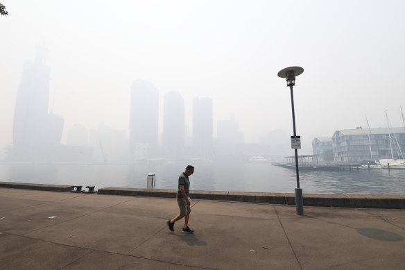 Sydney Harbour, thick with bushfire smoke, in early December, 2019. The prolonged exposure to bushfire smoke is estimated to have driven health costs to $1.95 billion.