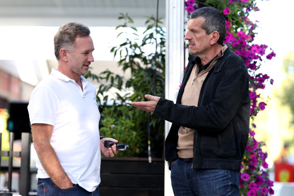 Oracle Red Bull Racing team principal Christian Horner speaks to Guenther Steiner at Albert Park on Thursday.