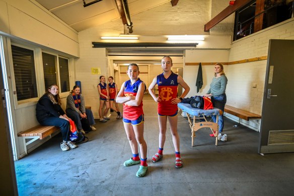 Fitzroy Football Club players Bella Moon (left) and Pippa Smith in the change rooms at Brunswick Street Oval.