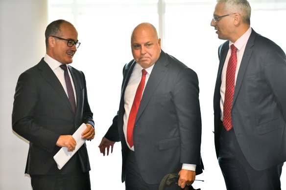 Three of seven decision-makers: (from left) Mr Merlino, Treasurer Tim Pallas and acting Police Minister Danny Pearson.