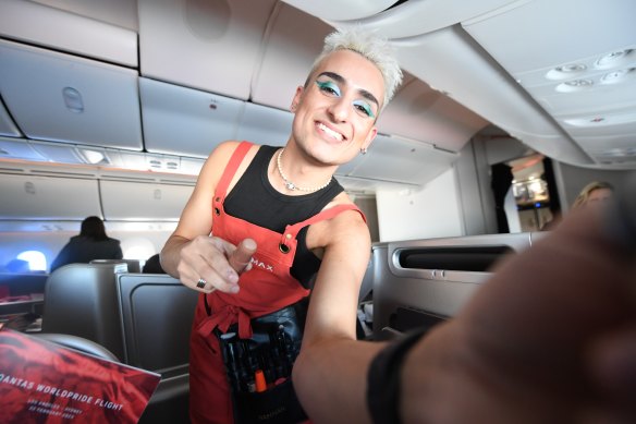 Makeup artist Xander helps passengers apply their eye shadow ahead of arrival in Sydney.