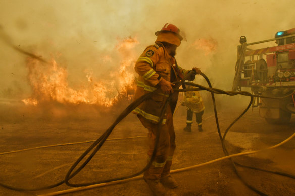 Spot fires threaten to overwhelm RFS firefighters at the Hillville fire last November during a season that involved 186,000 shifts by volunteers.